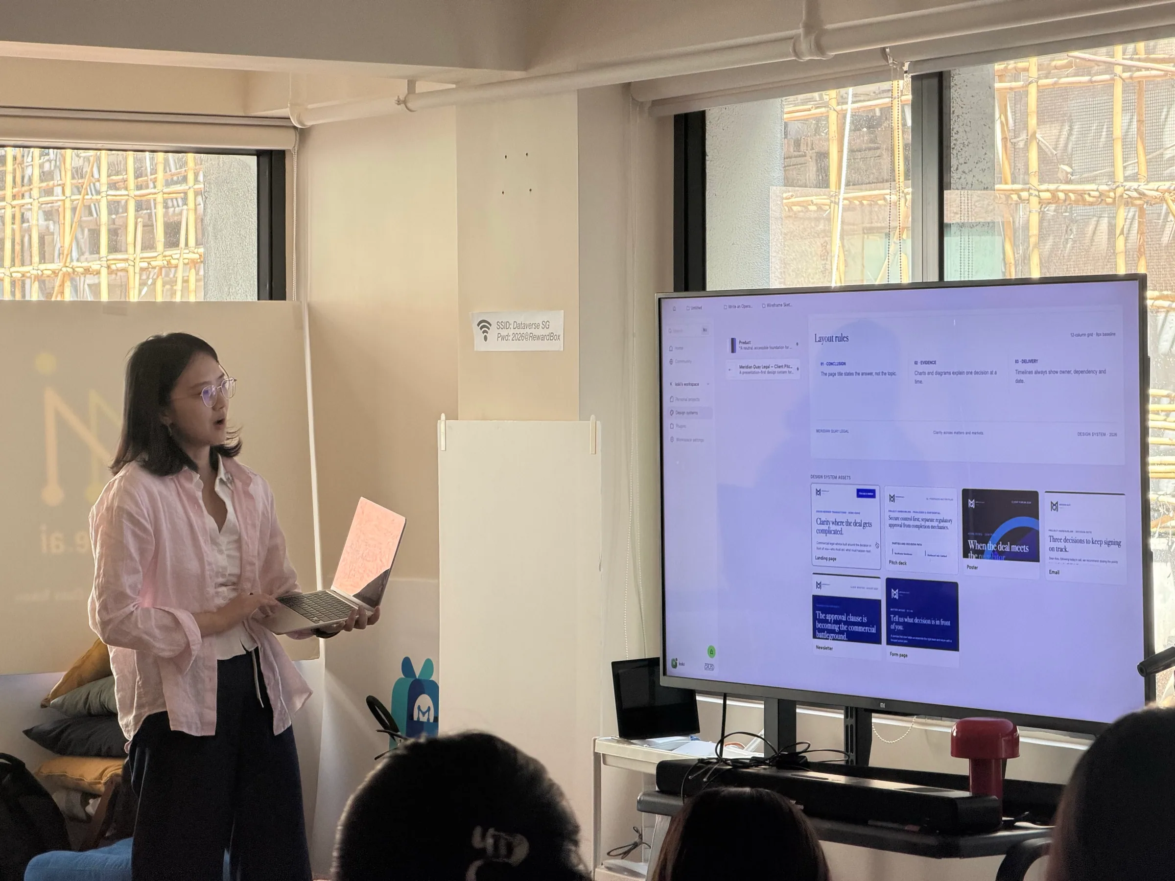 A participant presenting a design system workflow in OpenDesign.